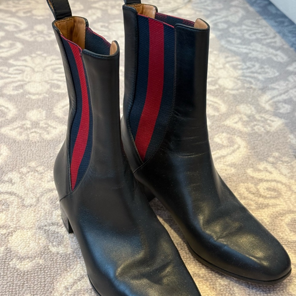 Stylish Black Leather Boots with Red Accents